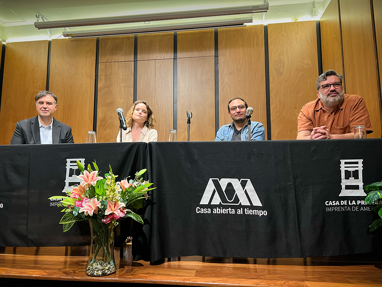 Philippe Paquet, Iris Pakulla, Miguel Vázquez, and Antonio Zirión during the panel discussion at the House of the First Printing Press in the Americas