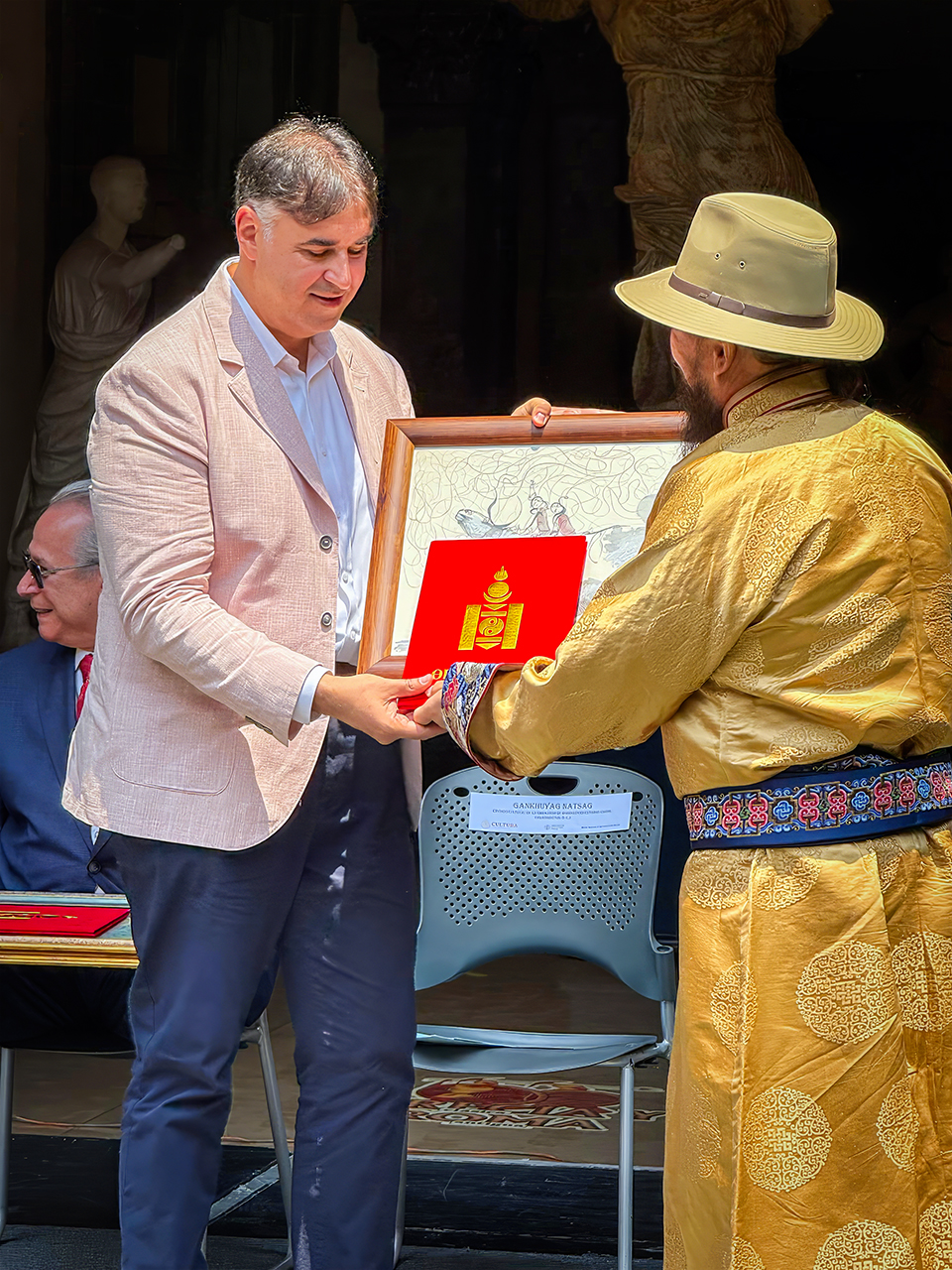 Receiving the Cultural Envoy of Mongolia Award in recognition of my photography from Gankhuyag Natsag, Cultural Envoy of Mongolia